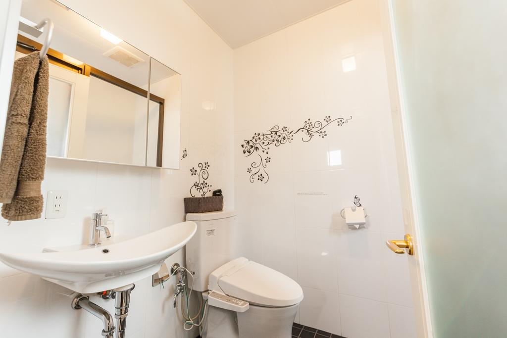 Villa Hide House Chatan Esterno foto